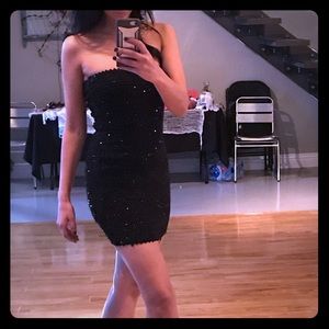Stretch sequin (zipper) little black dress.